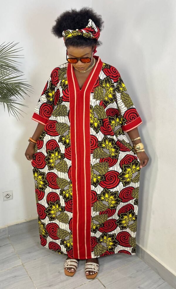 Robe wax rouge blanche à motif spirale pour femme – Style audacieux à Abidjan