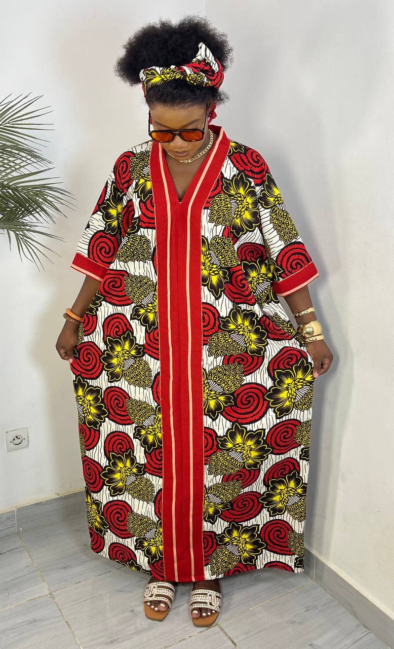 Robe wax rouge blanche à motif spirale pour femme – Style audacieux à Abidjan
