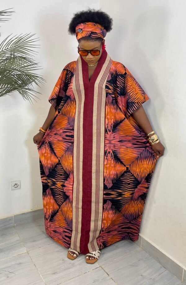 Robe wax orange noir abstrait – Élégance audacieuse à Abidjan